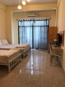 Postel nebo postele na pokoji v ubytování Joox B - Serviced Apartment
