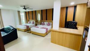 Postel nebo postele na pokoji v ubytování Cozy Hotel@ KL Sentral