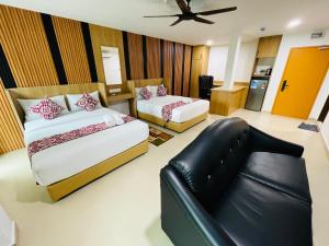 Postel nebo postele na pokoji v ubytování Cozy Hotel@ KL Sentral