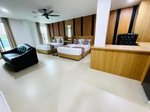 Postel nebo postele na pokoji v ubytování Cozy Hotel@ KL Sentral