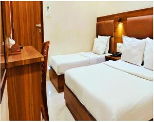 Postel nebo postele na pokoji v ubytování Hotel Avion Palace