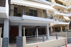 an external view of a building with a balcony at LA Larissa Luxury Apartments Thetis in Larisa