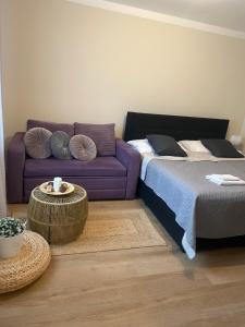 Ένα ή περισσότερα κρεβάτια σε δωμάτιο στο STING Apartments Havířov