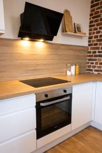 Küche/Küchenzeile in der Unterkunft Appartement Duplex en Centre-Ville de Cambrai - 110m2