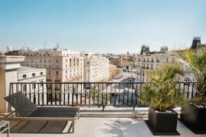 a balcony with a view of a city at Hotel Villa Real, a member of Preferred Hotels & Resorts in Madrid