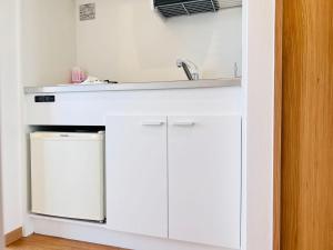 Kjøkken eller kjøkkenkrok på YSTY-HOTEL-2dk