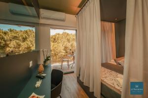 Postel nebo postele na pokoji v ubytování Al Pescatore Suites + 23 fotografií