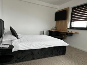 Ліжко або ліжка в номері Belvedere Restaurant & Rooms