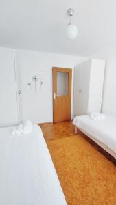 Un pat sau paturi într-o cameră la Harmony House Velenje