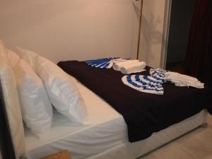 Letto o letti in una camera di Maafushi View