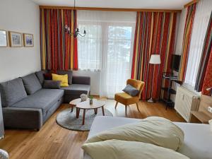 A seating area at appartementen Haus Bergblick