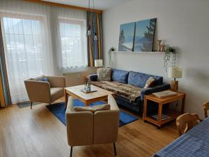 A seating area at appartementen Haus Bergblick
