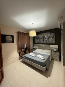Villa Margherita tesisinde bir odada yatak veya yataklar