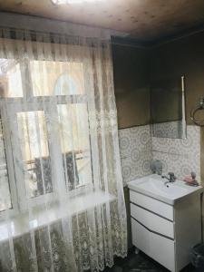 a bathroom with a sink and a window at YAKKA MINOR in Samarkand +72 photos