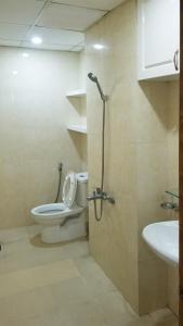 a bathroom with a toilet and a sink at CH Mường Thanh Luxury 60 Trần Phú. Nha Trang in Nha Trang