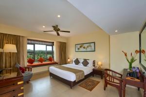 The Raviz Kadavu, Kozhikode客房内的一张或多张床位