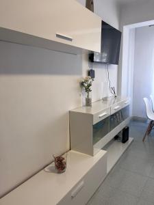 TV a/nebo společenská místnost v ubytování Apartamento Portbou