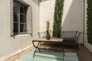 Un patio sau altă zonă în aer liber la La Maison Verte de Carcassonne