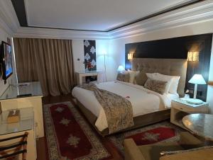 Postel nebo postele na pokoji v ubytování Royal Mirage Fes Hotel