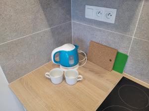 Príslušenstvo na prípravu kávy alebo čaju v ubytovaní Apartmán Neva Galanta