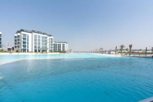 Bazén v ubytování One Bedroom - 10min from Burj Khalifa - Lagoon View nebo v jeho okolí