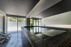 a large swimming pool in a house at Bordoy Cosmopolitan in Playa de Palma