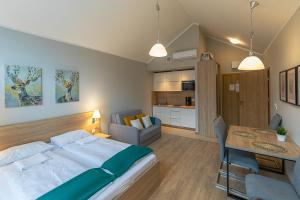 Kuchyň nebo kuchyňský kout v ubytování RentPlanet - Studio Górna Resorts