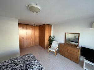 Televiisor ja/või meelelahutuskeskus majutusasutuses Playa Laguna, Laguna Beach, Torrox Costa