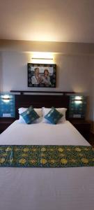 Ένα ή περισσότερα κρεβάτια σε δωμάτιο στο JJ Tribal Inn