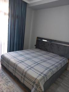 Posteľ alebo postele v izbe v ubytovaní Karavan Saray house