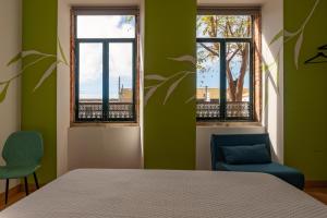 Postel nebo postele na pokoji v ubytování Leevin Guesthouse