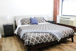 מיטה או מיטות בחדר ב-The Haas, Trademark Collection by Wyndham