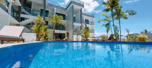 Bazén v ubytování Ocean Breeze Apartment nebo v jeho okolí