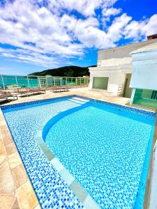 Πισίνα στο ή κοντά στο Eu Amo Arraial Hospedagem - Luz do Sol Prainha - ATÉ 10 Pessoas