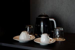 Příslušenství pro přípravu čaje a kávy v ubytování Art Legacy Hotel Baixa-Chiado