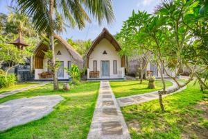 Κήπος έξω από το Ananta Bungalow