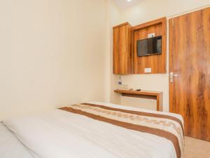 TV a/nebo společenská místnost v ubytování Hotel BKC Fortune