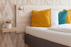 Postel nebo postele na pokoji v ubytování Prince Apartments