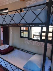 Postel nebo postele na pokoji v ubytování Riad Hostel JAD ZIAD + 37 fotografií