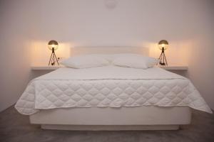 Cama ou camas em um quarto em Fanari Vista Suites