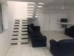 TV a/nebo společenská místnost v ubytování Casa Beira Mar em Guaratuba