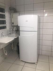 Kuchyň nebo kuchyňský kout v ubytování Casa Beira Mar em Guaratuba