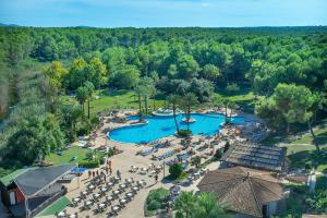 an overhead view of a pool at a resort at Exagon Park in Can Picafort