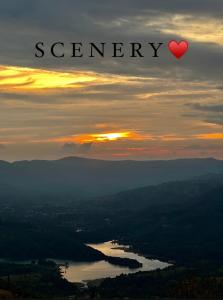 a sunset with the words cemetery and a heart in the sky at Heavens Edge Resort in Mahabaleshwar