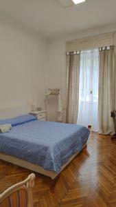 Llit o llits en una habitació de Treehouse Milano