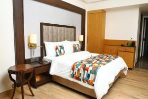 Voodi või voodid majutusasutuse BluSalzz Residence Amritsar toas