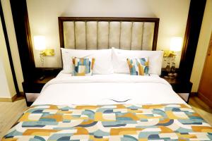 Voodi või voodid majutusasutuse BluSalzz Residence Amritsar toas