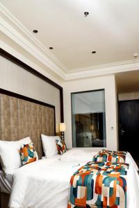 Voodi või voodid majutusasutuse BluSalzz Residence Amritsar toas