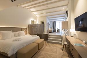 Posteľ alebo postele v izbe v ubytovaní Hotel Encinar de Sotogrande