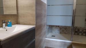 a bathroom with a sink and a shower at CconfortHotels R&B Central Rooms in Bari